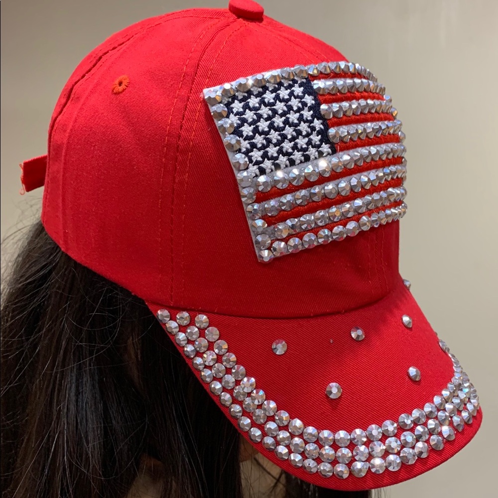 Red cap with American flag and rhinestones around